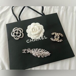 Chanel brooches